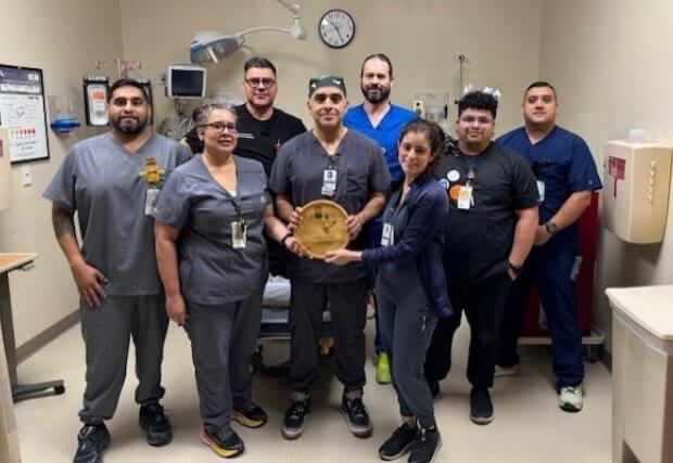 Members of the Emergency Department receiving the award